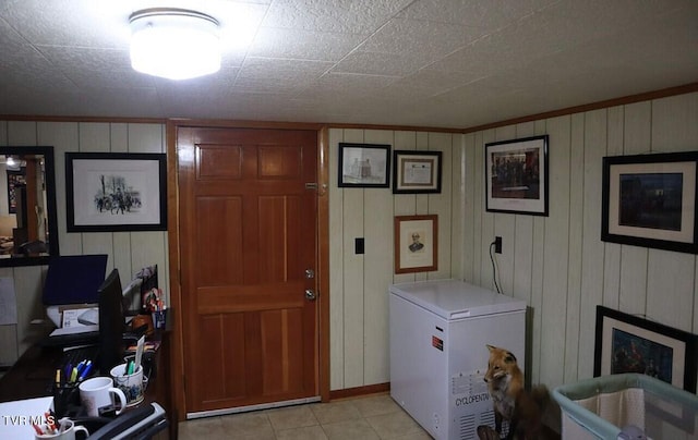 3219 Dungannon Rd, Coeburn, VA 24230 - laundry area with light tile patterned floors, crown molding, and wood walls