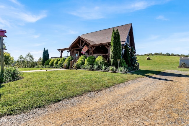 121 Hulse Rd, Jonesborough, TN 37659 - view of front of home featuring a front lawn, covered porch, and a shingled roof