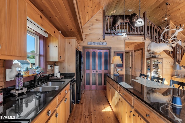 121 Hulse Rd, Jonesborough, TN 37659 - kitchen featuring black appliances, hardwood / wood-style floors, wooden ceiling, wooden walls, and lofted ceiling