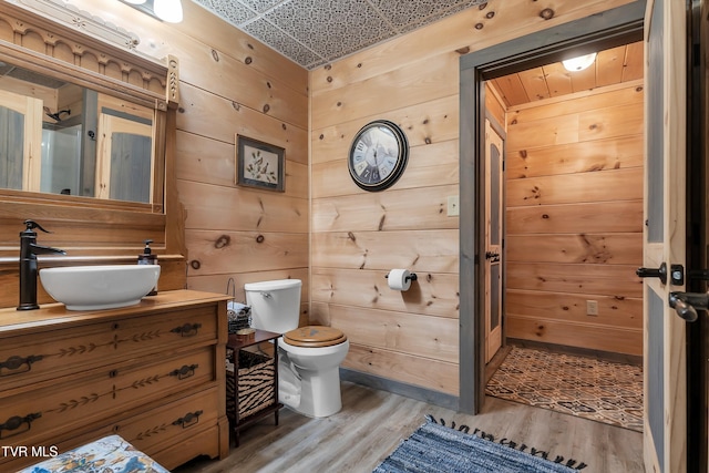121 Hulse Rd, Jonesborough, TN 37659 - bathroom with wood finished floors, vanity, and wood walls