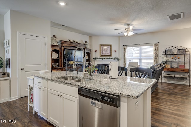 194 Wanderlust Ct, Johnson City, TN 37604 - kitchen featuring dishwasher, ceiling fan, open floor plan, a kitchen island with sink, and dark wood-style flooring