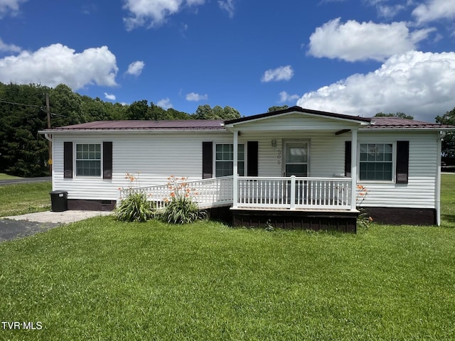 505 NE Lake St, Wise, VA 24293 - manufactured / mobile home with covered porch, a front lawn, and a metal roof