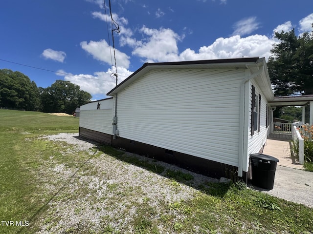 505 NE Lake St, Wise, VA 24293 - view of home's exterior featuring crawl space and a lawn