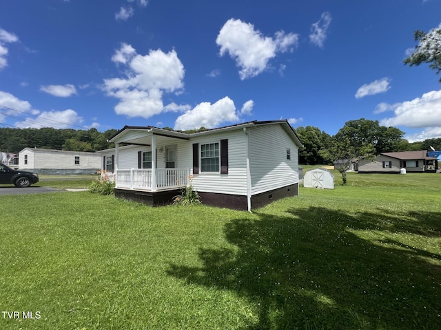 505 NE Lake St, Wise, VA 24293 - view of side of home featuring crawl space, a storage unit, a yard, and a deck