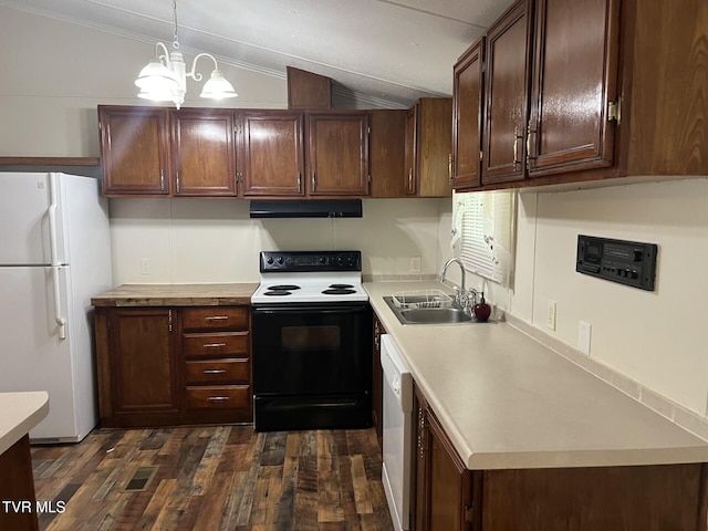 505 NE Lake St, Wise, VA 24293 - kitchen featuring white appliances, under cabinet range hood, vaulted ceiling, light countertops, and dark wood finished floors