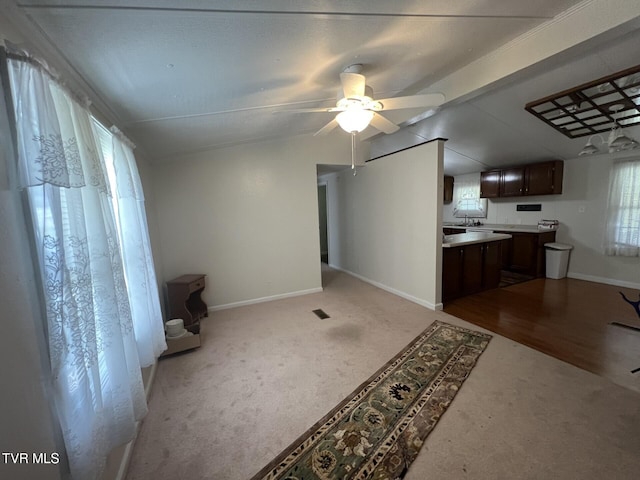 505 NE Lake St, Wise, VA 24293 - unfurnished living room with carpet flooring, a ceiling fan, and lofted ceiling