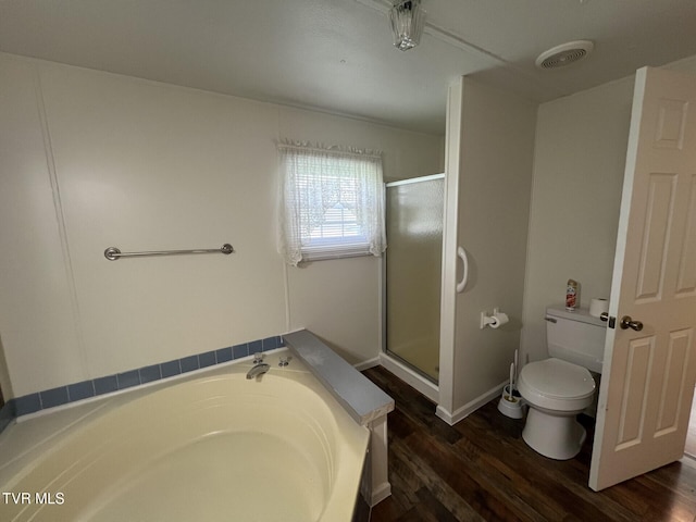 505 NE Lake St, Wise, VA 24293 - bathroom featuring wood finished floors, a bath, and a stall shower