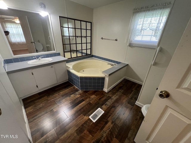 505 NE Lake St, Wise, VA 24293 - full bathroom featuring a bath, wood finished floors, and vanity