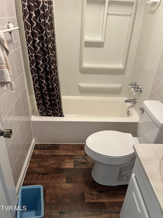 505 NE Lake St, Wise, VA 24293 - full bathroom featuring vanity, shower / bath combo, and wood finished floors