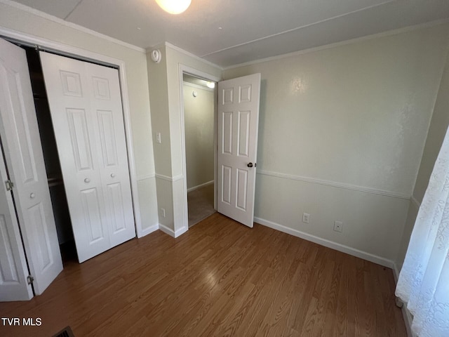 505 NE Lake St, Wise, VA 24293 - unfurnished bedroom with wood finished floors, a closet, and ornamental molding