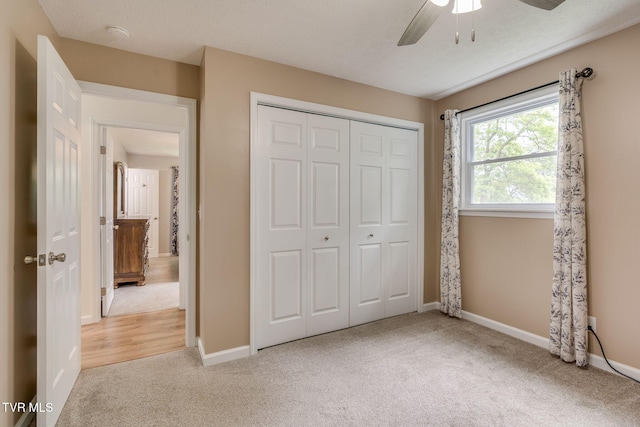380 Lovelace Loop, Mountain View Loop, Fall Branch, TN 37656 - unfurnished bedroom with carpet, a closet, and ceiling fan