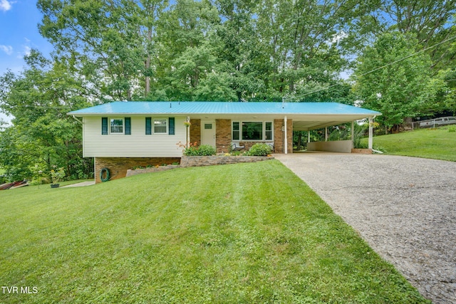 380 Lovelace Loop, Mountain View Loop, Fall Branch, TN 37656 - view of front of property featuring driveway, a front lawn, an attached carport, and a metal roof