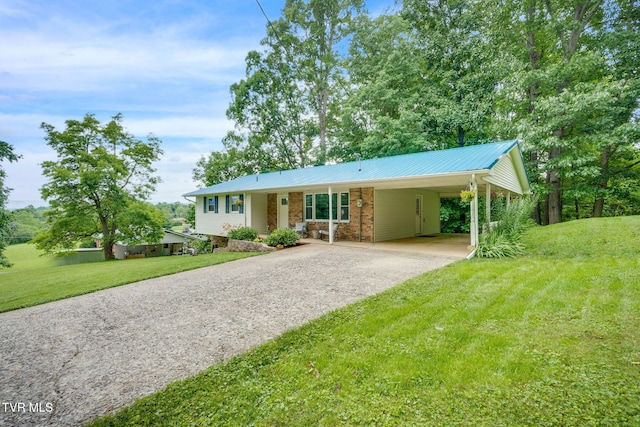 380 Lovelace Loop, Mountain View Loop, Fall Branch, TN 37656 - single story home with gravel driveway, a front lawn, a carport, and a metal roof