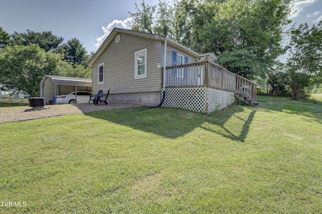1277 Cooks Valley Rd, Kingsport, TN 37664 - view of property exterior with a lawn, a deck, and a detached carport