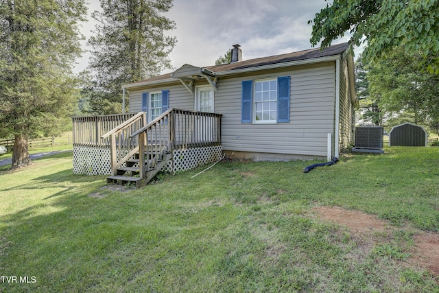 1277 Cooks Valley Rd, Kingsport, TN 37664 - view of front of home with a chimney, a front lawn, and a deck