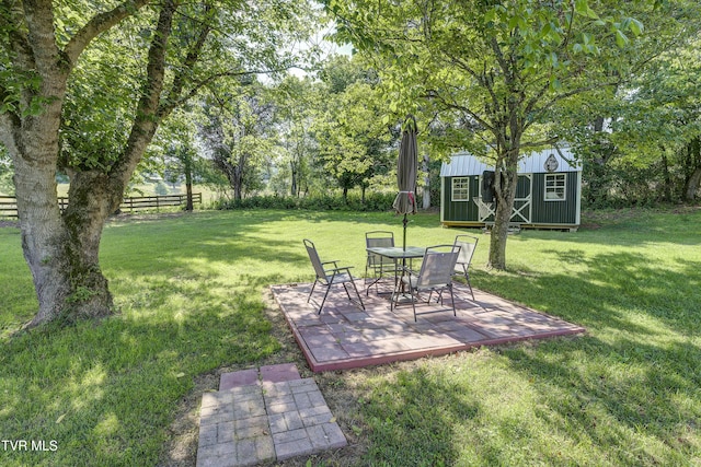 1277 Cooks Valley Rd, Kingsport, TN 37664 - view of yard featuring an outbuilding and a patio area