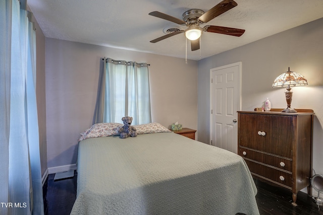 1277 Cooks Valley Rd, Kingsport, TN 37664 - bedroom featuring dark wood-style flooring and a ceiling fan