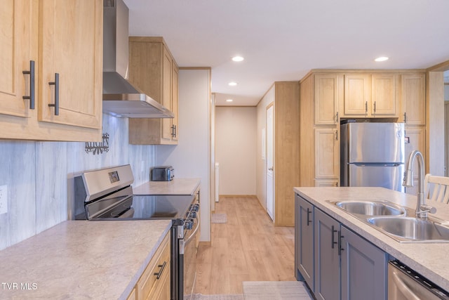 120 Maple Crest Cir, Surgoinsville, TN 37873 - kitchen with appliances with stainless steel finishes, wall chimney exhaust hood, light brown cabinets, light wood-style floors, and recessed lighting