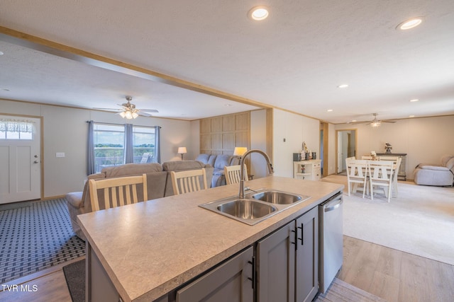 120 Maple Crest Cir, Surgoinsville, TN 37873 - kitchen featuring open floor plan, ceiling fan, stainless steel dishwasher, an island with sink, and gray cabinetry