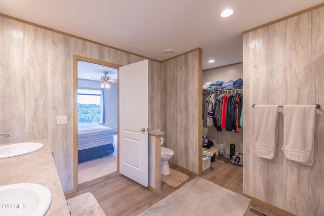120 Maple Crest Cir, Surgoinsville, TN 37873 - ensuite bathroom with wood finished floors, double vanity, recessed lighting, and a spacious closet