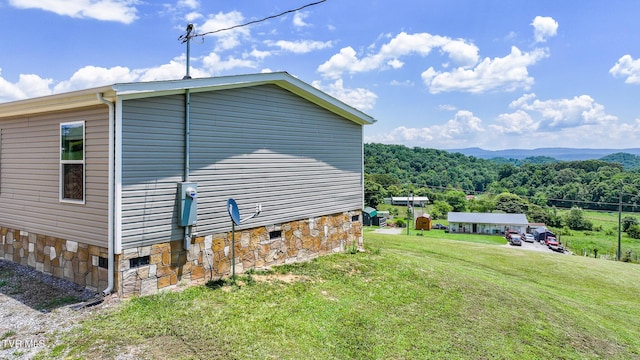 120 Maple Crest Cir, Surgoinsville, TN 37873 - view of property exterior with a lawn and crawl space