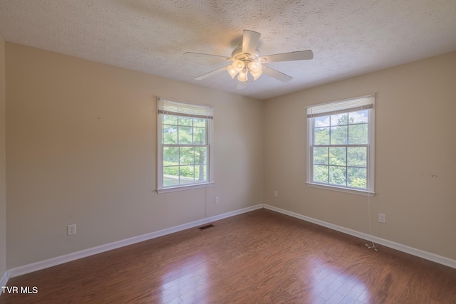 124 Maple Crest Cir, Surgoinsville, TN 37873 - unfurnished room featuring wood finished floors, a textured ceiling, and a ceiling fan