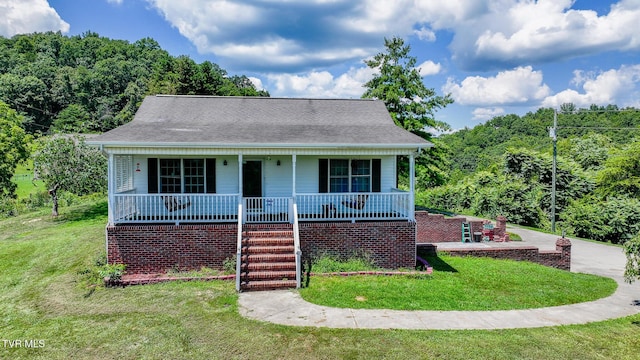 124 Maple Crest Cir, Surgoinsville, TN 37873 - bungalow-style house featuring a front yard, a porch, stairs, and a shingled roof
