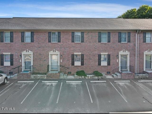 1203 E 8th Ave Unit 3, Johnson City, TN 37601 - multi unit property featuring uncovered parking and brick siding