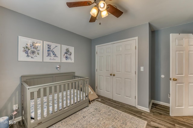103 Daniels Way, Johnson City, TN 37615 - bedroom with a closet, wood finished floors, a crib, and a ceiling fan