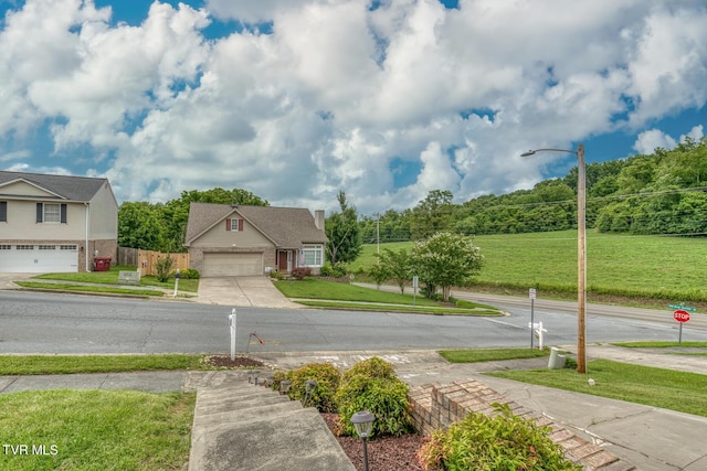 103 Daniels Way, Johnson City, TN 37615 - view of asphalt road featuring sidewalks and street lighting