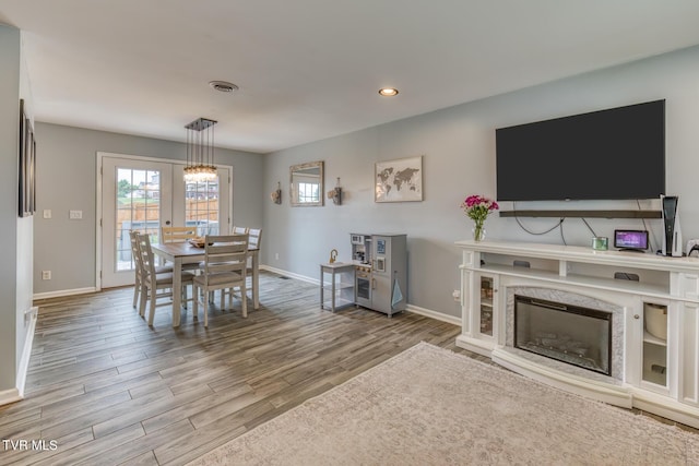 103 Daniels Way, Johnson City, TN 37615 - dining area with wood finished floors, healthy amount of natural light, recessed lighting, and a high end fireplace