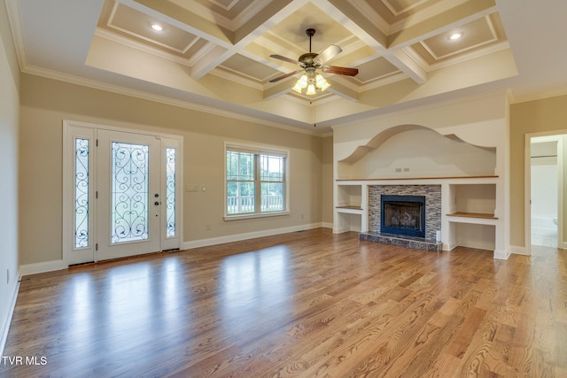 397 Ridgecrest Rd, Jonesborough, TN 37659 - unfurnished living room featuring a ceiling fan, ornamental molding, coffered ceiling, a stone fireplace, and light wood-type flooring
