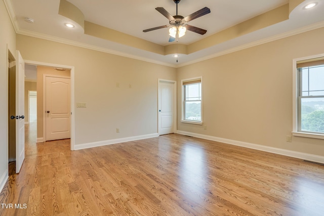397 Ridgecrest Rd, Jonesborough, TN 37659 - empty room featuring a raised ceiling, ceiling fan, light wood-style flooring, crown molding, and a smoke detector