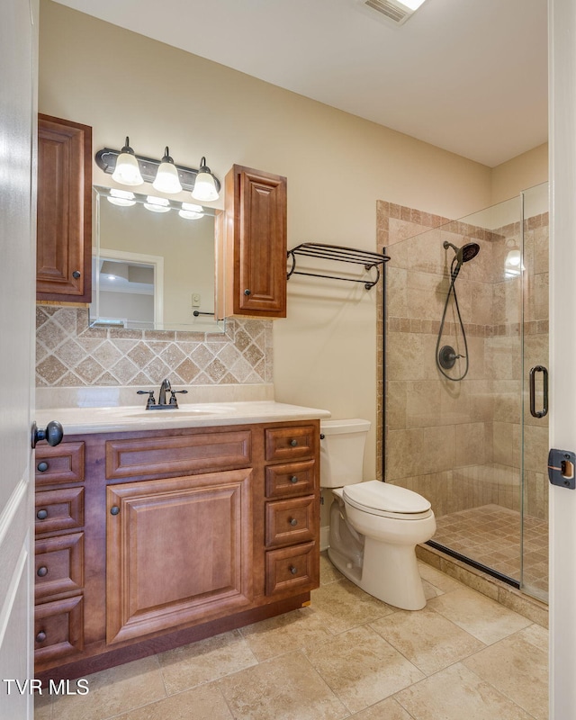 397 Ridgecrest Rd, Jonesborough, TN 37659 - bathroom featuring vanity, a stall shower, and decorative backsplash