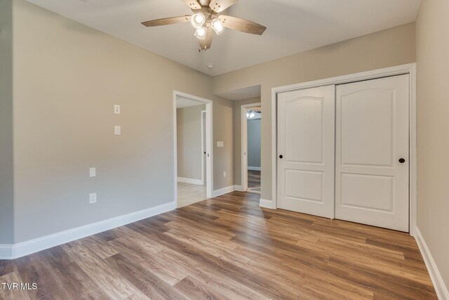 397 Ridgecrest Rd, Jonesborough, TN 37659 - unfurnished bedroom with light wood-style flooring, a closet, and ceiling fan