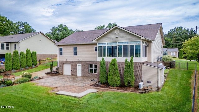 397 Ridgecrest Rd, Jonesborough, TN 37659 - back of property with a patio, a sunroom, brick siding, and roof with shingles