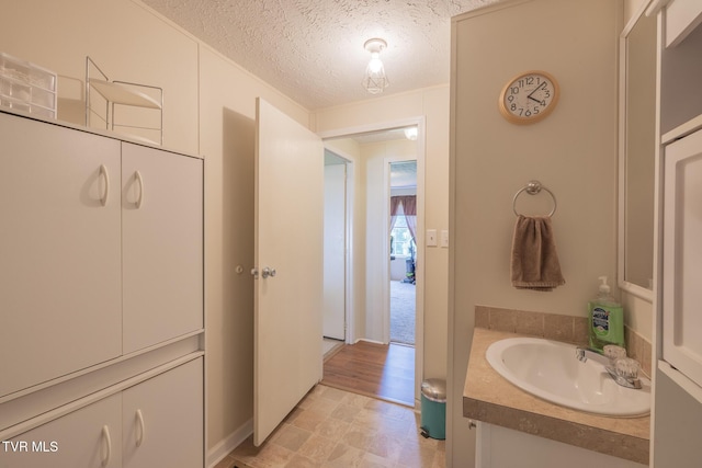 1070 Bill Martin Rd, Afton, TN 37616 - bathroom featuring a textured ceiling and vanity