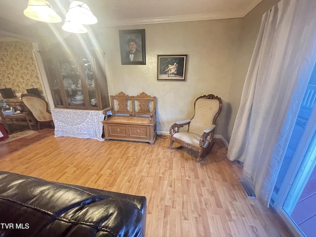 134 Carver Crabtree Rd, Hampton, TN 37658 - sitting room featuring light wood-style flooring and ornamental molding