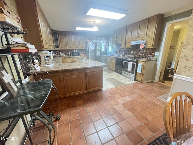 134 Carver Crabtree Rd, Hampton, TN 37658 - kitchen with black appliances, decorative backsplash, light tile patterned floors, and glass insert cabinets