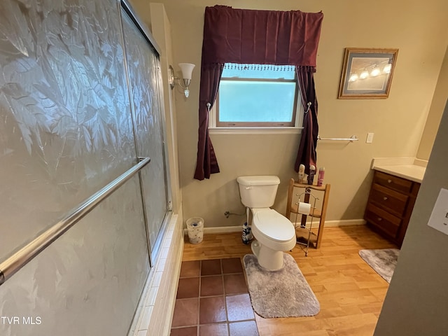 134 Carver Crabtree Rd, Hampton, TN 37658 - bathroom with vanity, a shower with door, and wood finished floors