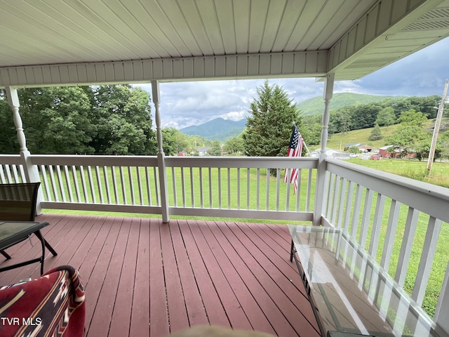 134 Carver Crabtree Rd, Hampton, TN 37658 - wooden terrace with a mountain view and a yard
