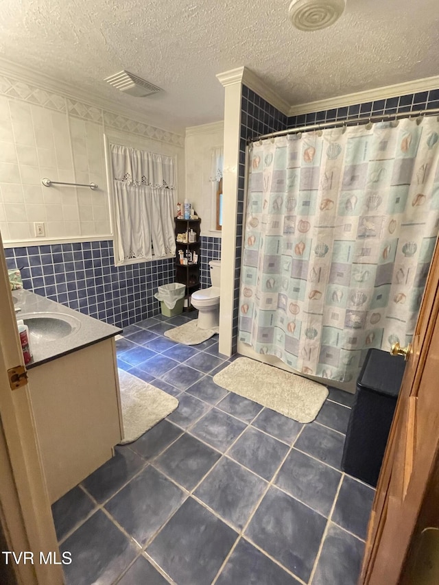 134 Carver Crabtree Rd, Hampton, TN 37658 - bathroom featuring tile walls, tile patterned floors, a textured ceiling, vanity, and a shower with shower curtain