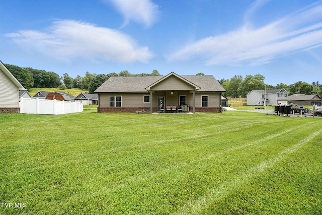 107 Ervin Loop, Erwin, TN 37650 - back of house with roof with shingles, a patio area, and brick siding