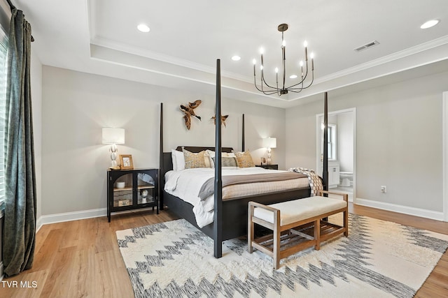 107 Ervin Loop, Erwin, TN 37650 - bedroom with a chandelier, light wood-style flooring, crown molding, recessed lighting, and a raised ceiling
