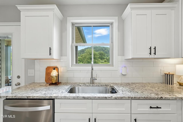 107 Ervin Loop, Erwin, TN 37650 - kitchen featuring dishwasher, white cabinets, and light stone countertops