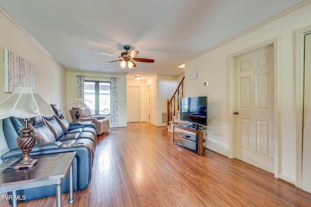 151 Woodcrest Ln Unit 0, Bristol, VA 24201 - living area featuring a ceiling fan, light wood-type flooring, stairway, and crown molding
