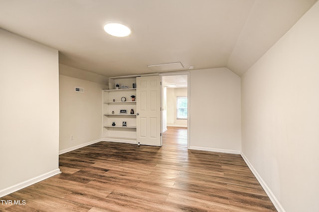 1648 E St, Kingsport, TN 37664 - additional living space featuring wood finished floors and attic access