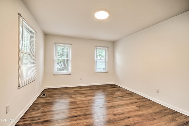 1648 E St, Kingsport, TN 37664 - empty room with dark wood-style floors