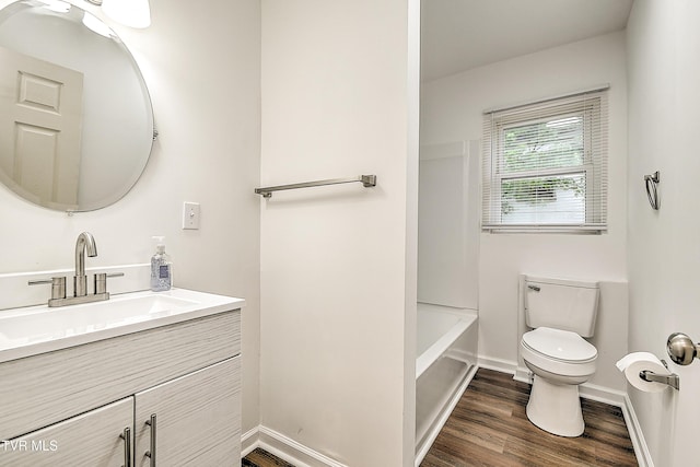 1648 E St, Kingsport, TN 37664 - full bath with vanity, wood finished floors, and shower / washtub combination