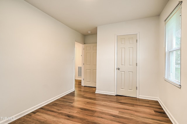 1648 E St, Kingsport, TN 37664 - unfurnished bedroom with wood finished floors